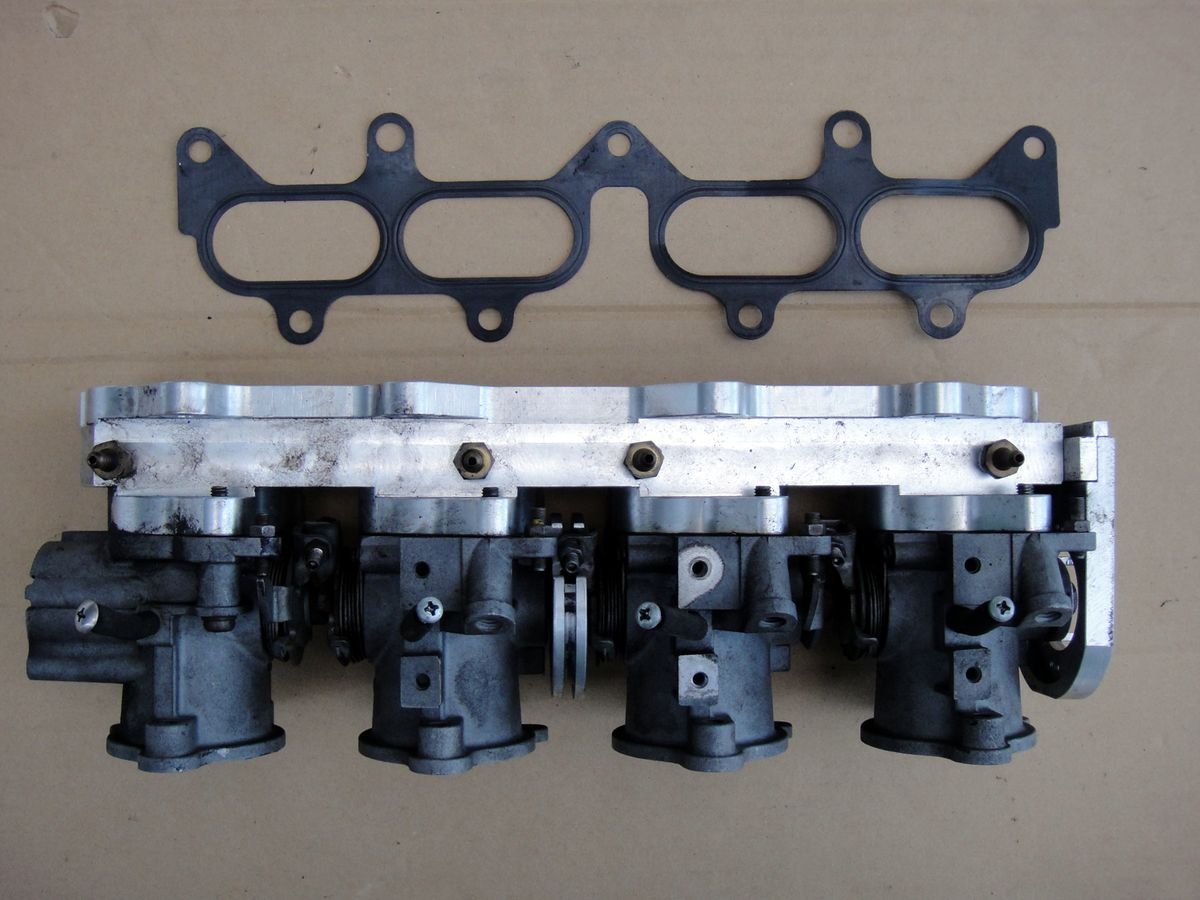 トヨタ純正 AE101 4連スロットル + AE86用4AG取り付け用アダプター